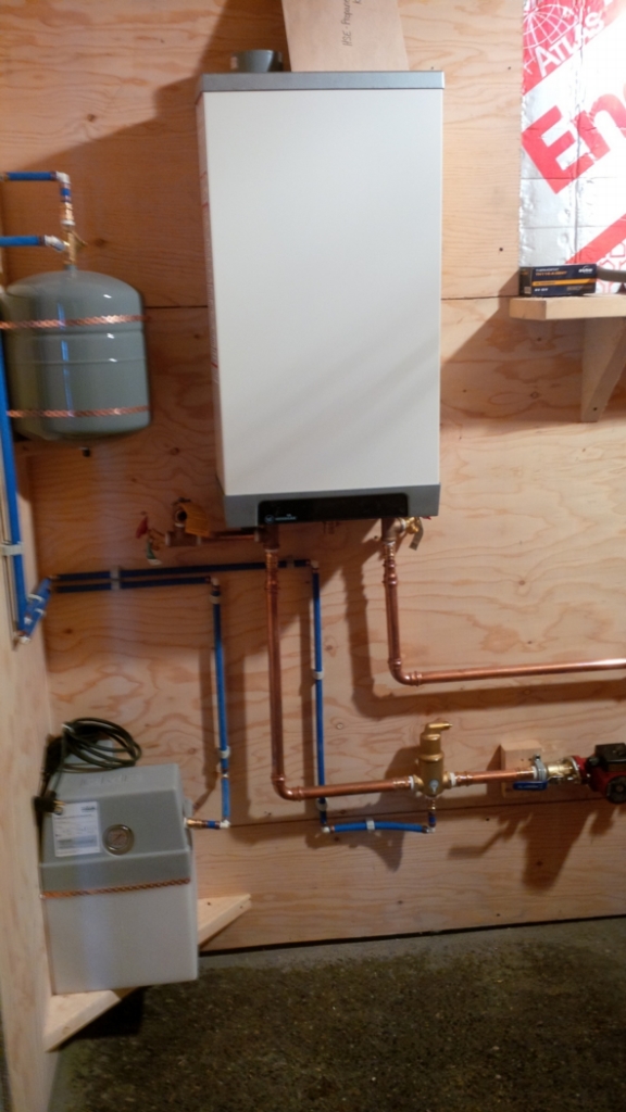 The high-efficiency condensing boiler heats the floor slab. Photo: Alain Hamel